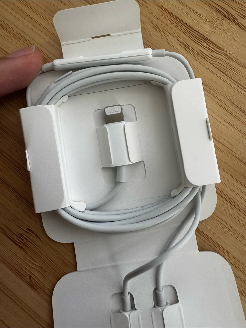 Brand new Apple white wired earbuds with lightning connector
